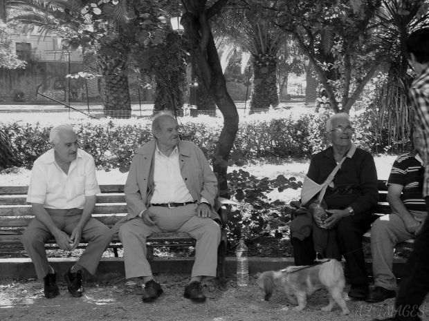 Old Greek folks at a park bench in Nafplio.
